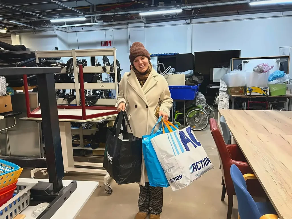 Woman carrying bags in a workspace<br>Tropical Medicine Internship